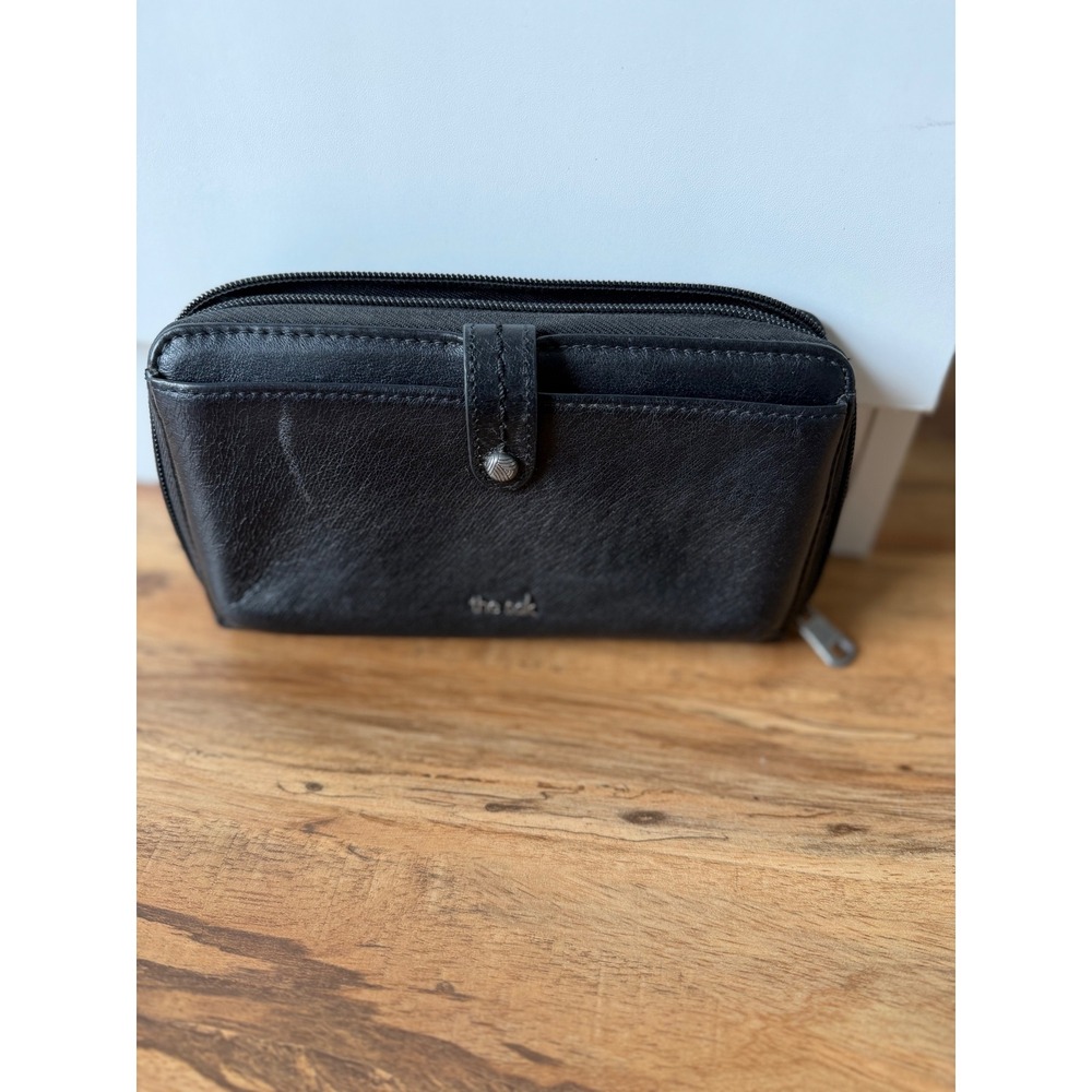 The Sak Black Leather Zip Around Wallet Teal Lining Snap Pocket
